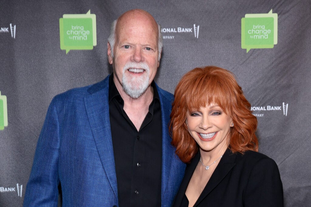 Rex Linn and Reba McEntire in October of 2023.