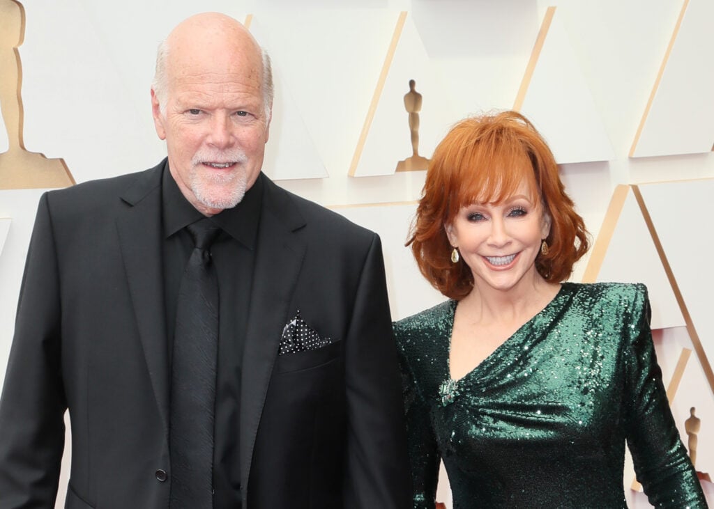 Reba McEntire and Rex Linn in March of 2022.