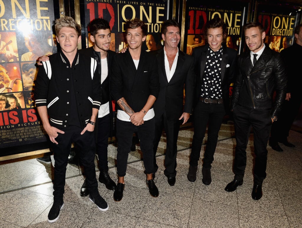 Simon Cowell with Liam Payne and other members of One Direction in 2013.